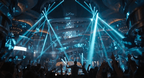 Luxurious empty VIP lounge with velvet seating and warm ambient lighting